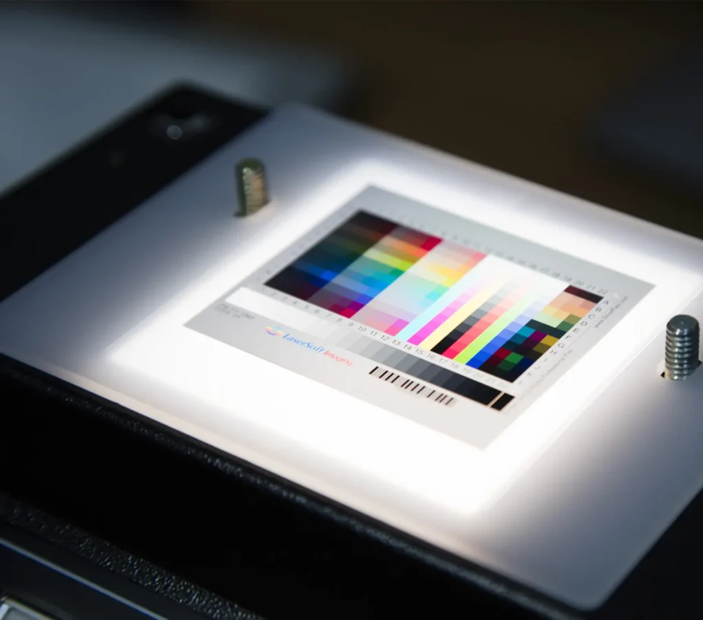 A photograph of a colour tester on top of a lighbox.