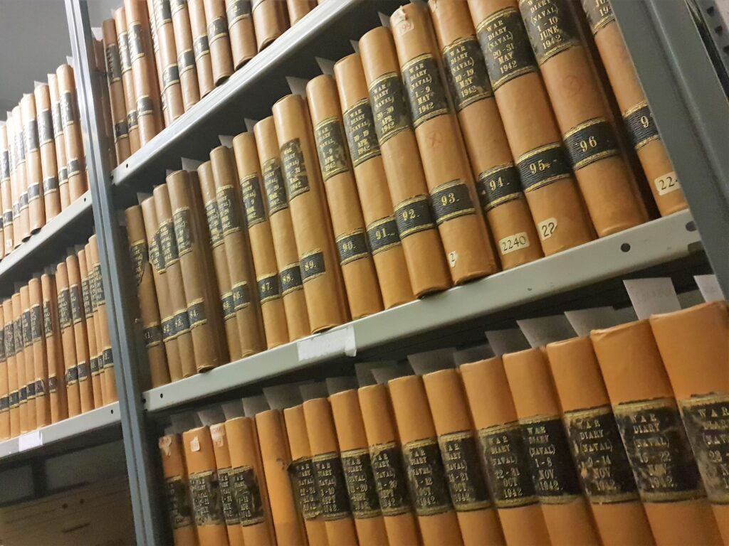 NHB books on a shelf